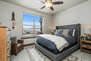Lower Level Master Bedroom 2 with a Queen Bed and Mountain Views