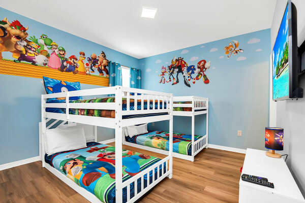 Our favorite video game characters go head to head in this 2x twin/twin bunk room with en-suite bathroom.