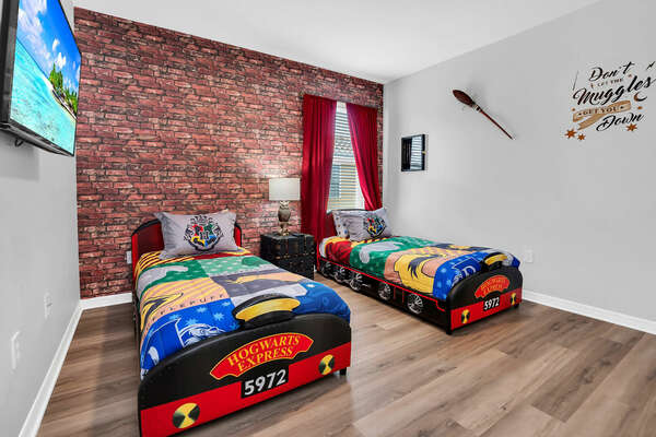 Muggles are welcome in this 2x twin bed room.