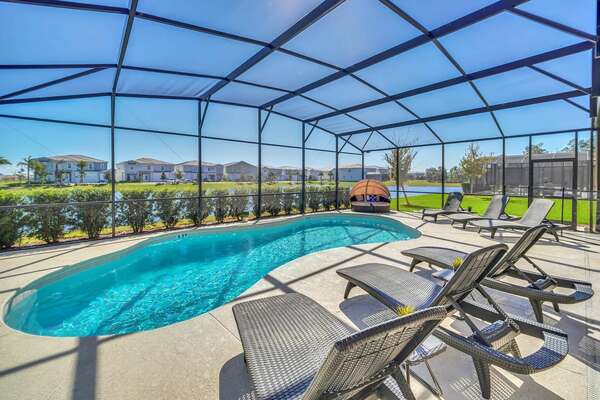 Large pool and deck, perfect for family gatherings with a relaxing lake view