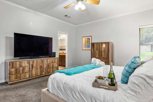 Master Bedroom with a King Bed and 60