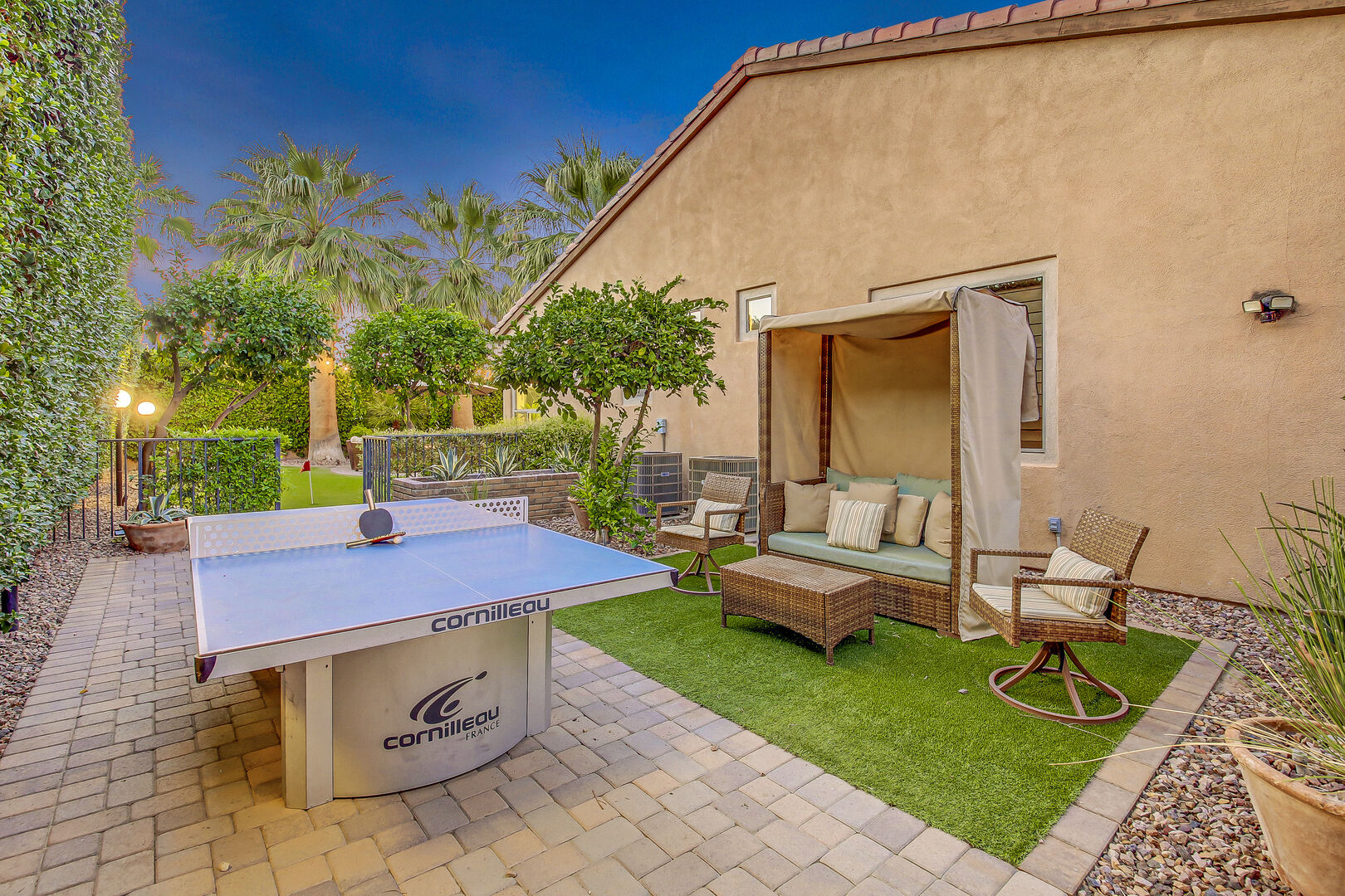 Team up and play a round of Ping-Pong or lounge on the resort style love seat.