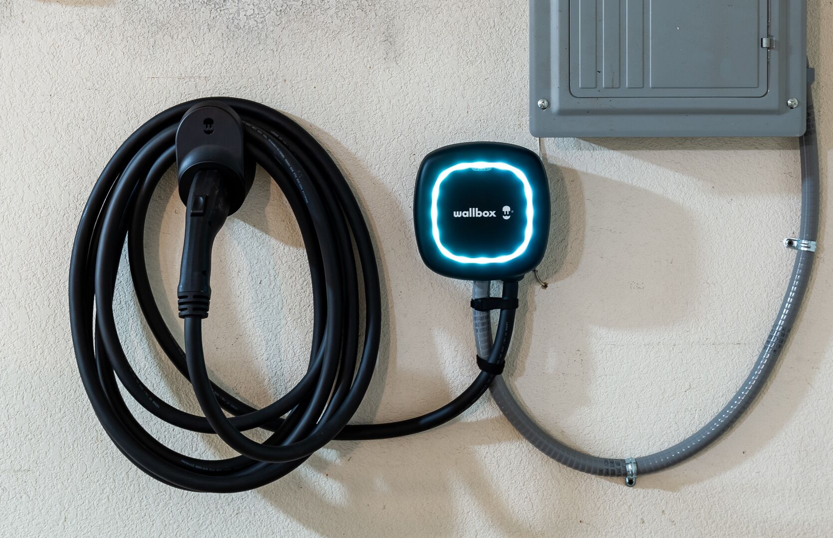 Wallbox EV charger accessible in the garage.