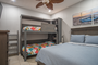 guest bedroom with custom, folding Murphy bed style bunk beds