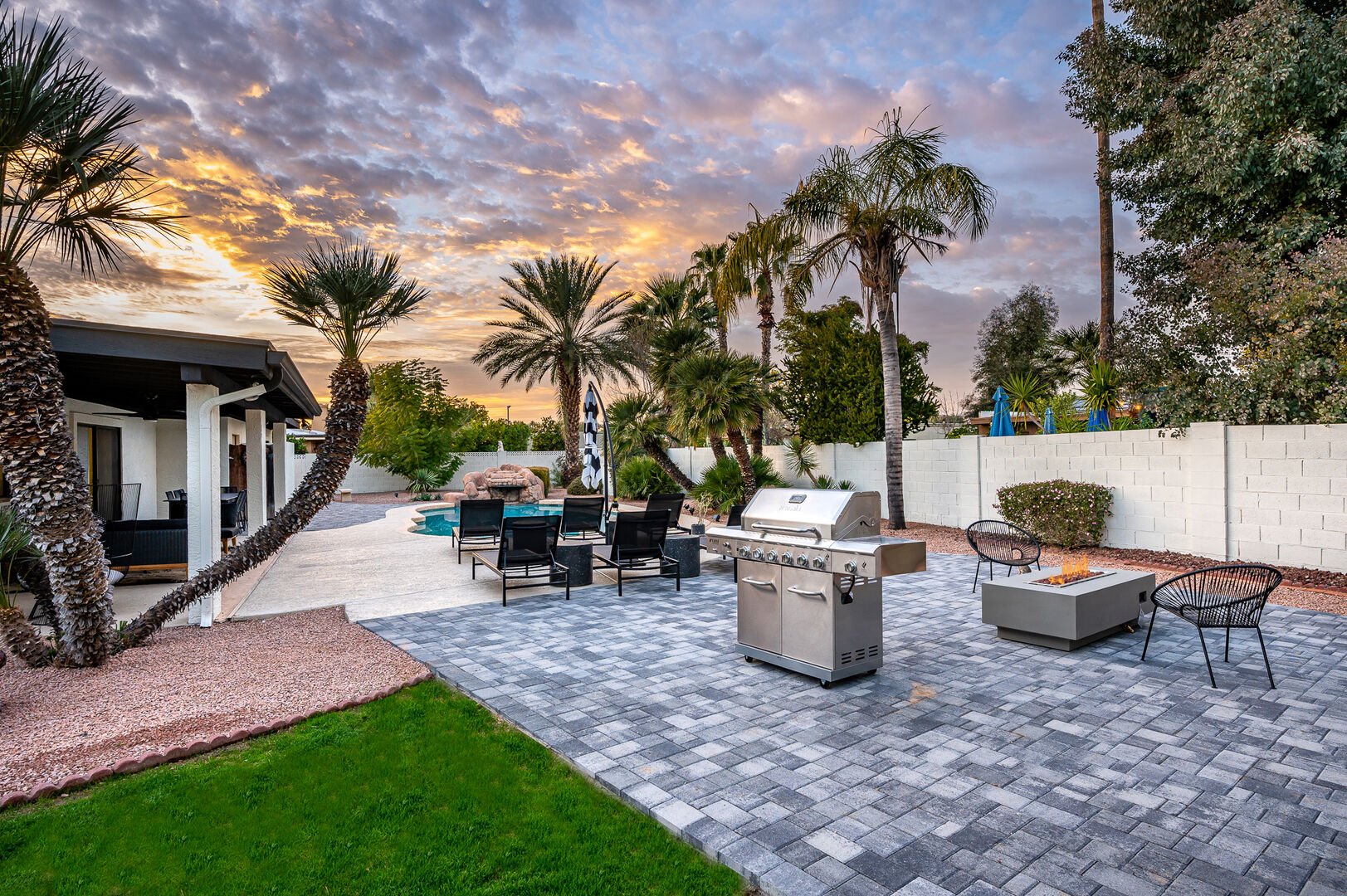 Outside grilling and lounging with the palm trees.