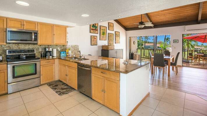 Well-equipped with granite countertops, quality wood cabinets and stainless-steel appliances