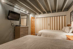 Bedroom 4 / Bedroom 5 / Loft : Two Queen Beds and Two Twin Beds separated by Accordion Wall Separator, Flatscreen TV
