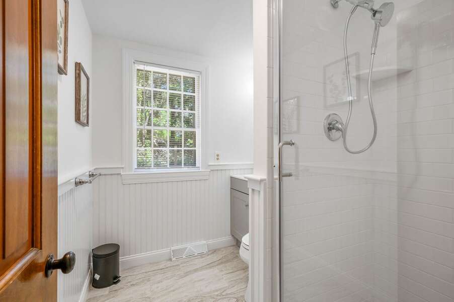 Convenient full bathroom (#4) with shower located near the laundry room and side entrance of the home - 5 Quivet Drive East Dennis - La Linda - NEVR