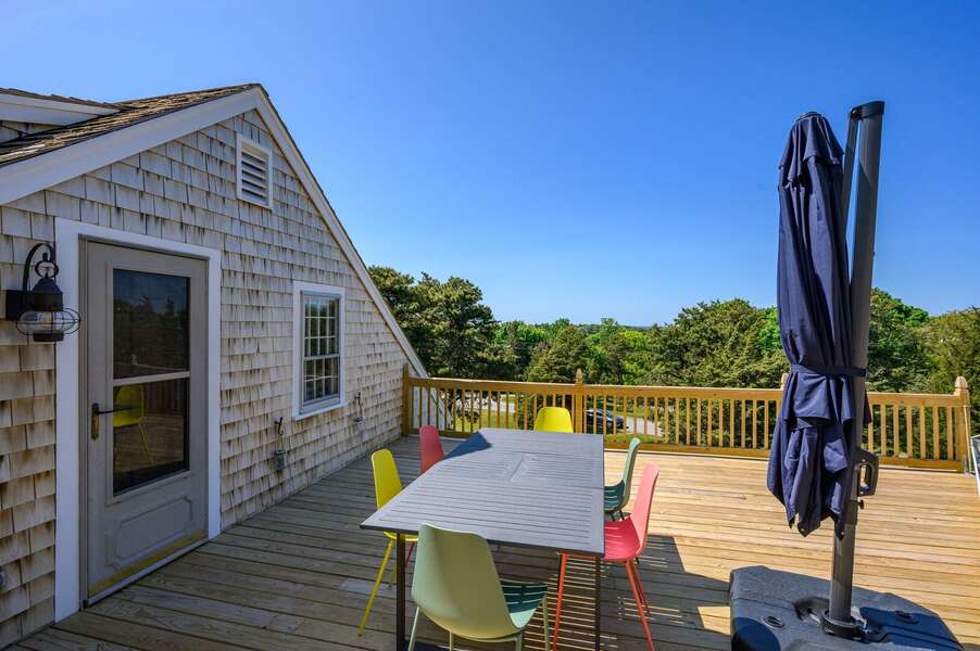 Bird's-eye-view of Cape Cod Bay from the deck of this home, perched on a hill - 5 Quivet Drive East Dennis - La Linda - NEVR