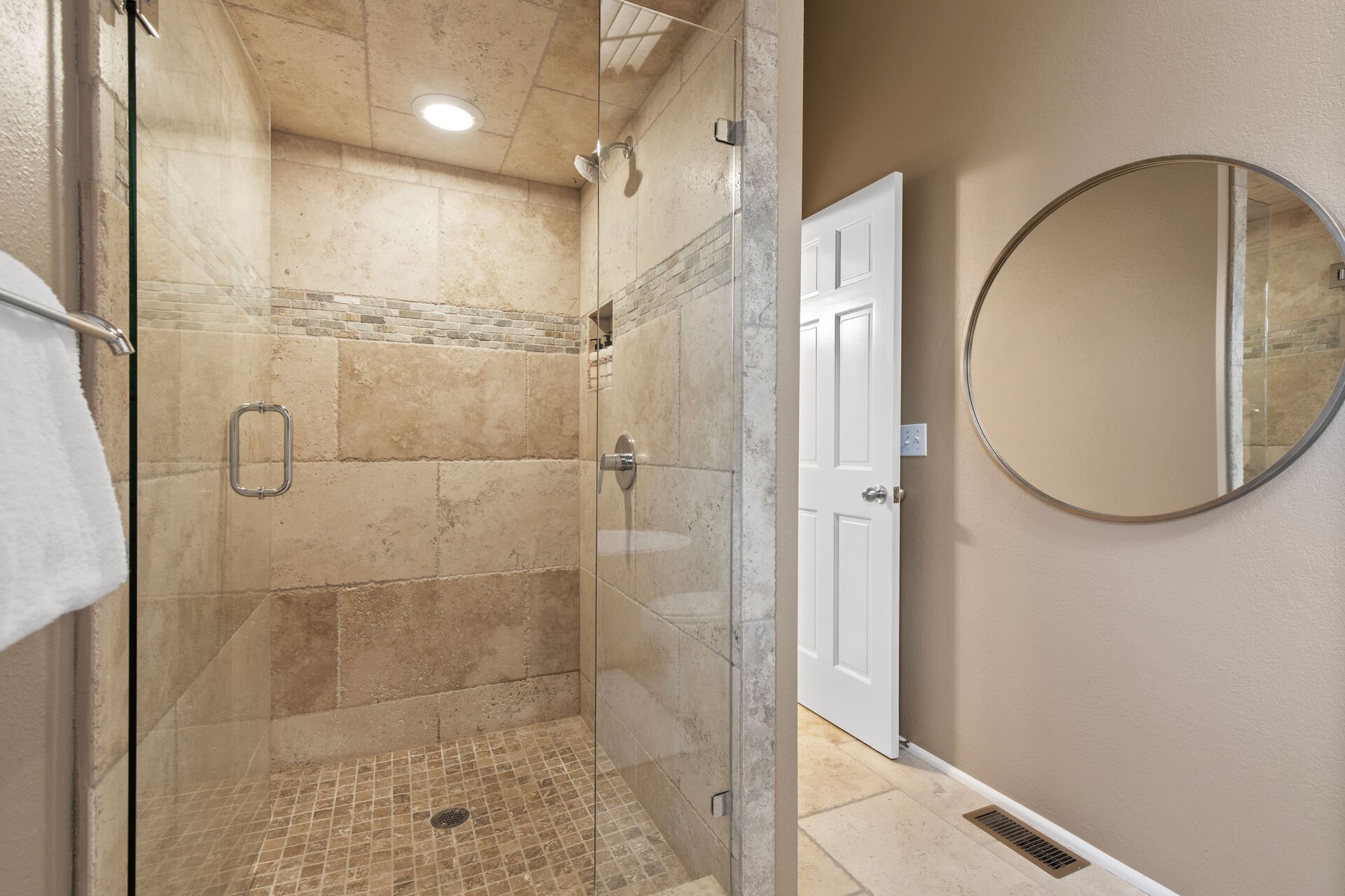 King size bed, walk-in closet, private balcony, and private bath with double sinks, tile shower and separate over-sized soaking tub