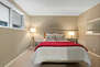 Queen size bed, and private bath with double sinks and tub/shower combo