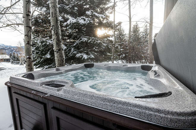 Private hot tub located at the side of the house