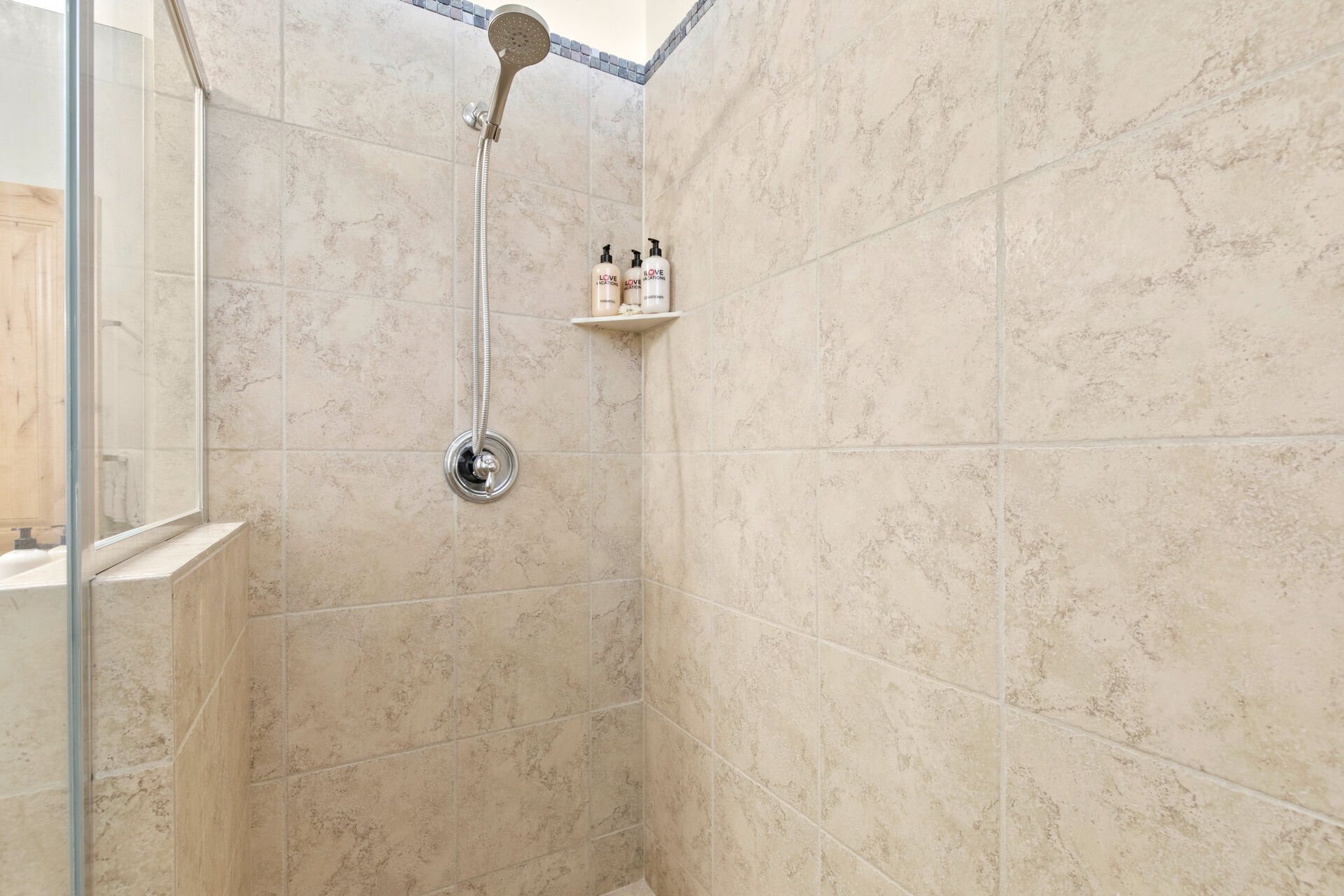 Master Bathroom with tile and glass shower