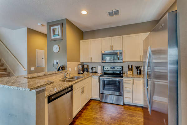 Kitchen showing stainless steel appliances