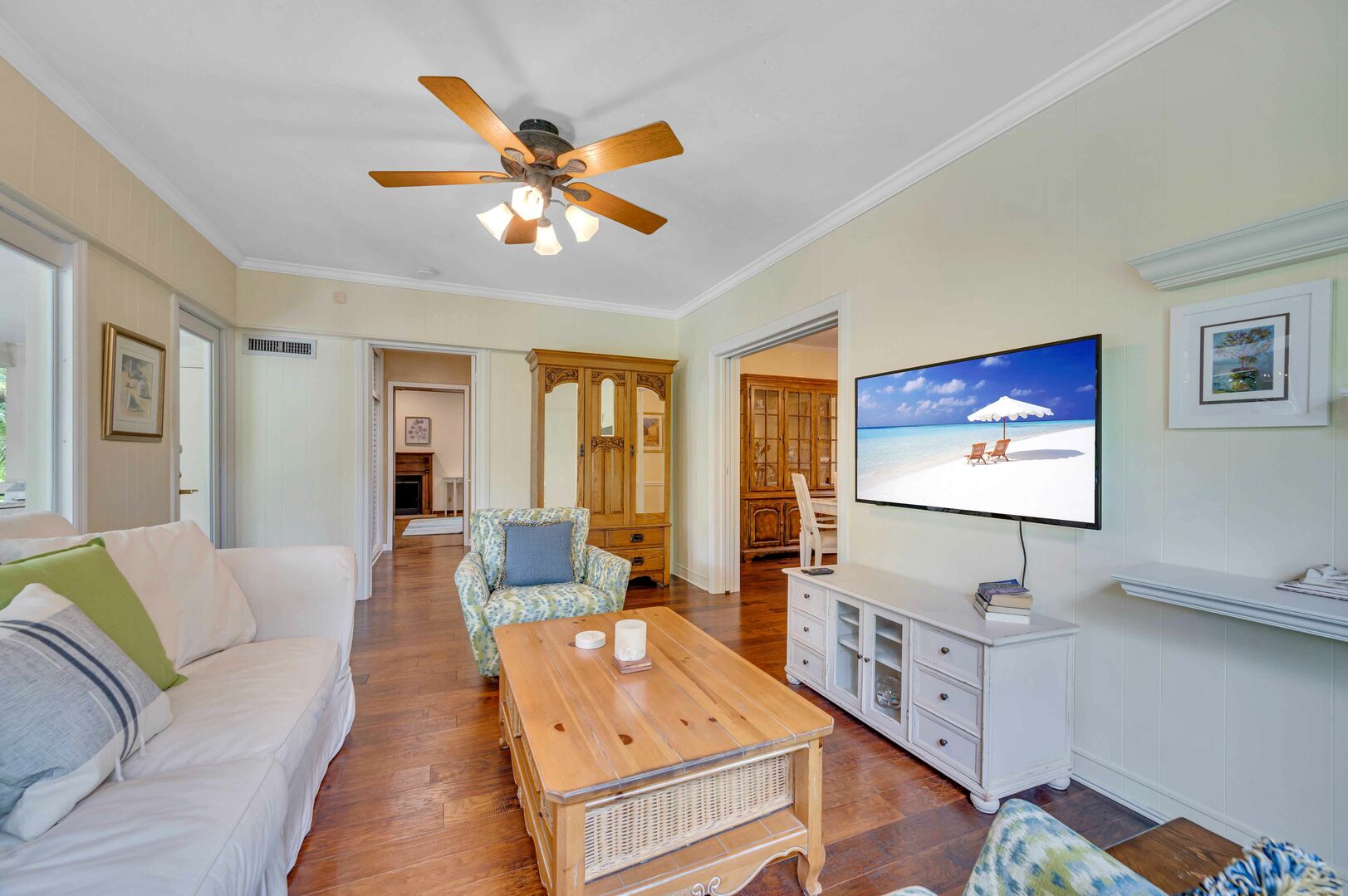 The family room has a view of the pool and is equipped with a smart TV for your enjoyment.