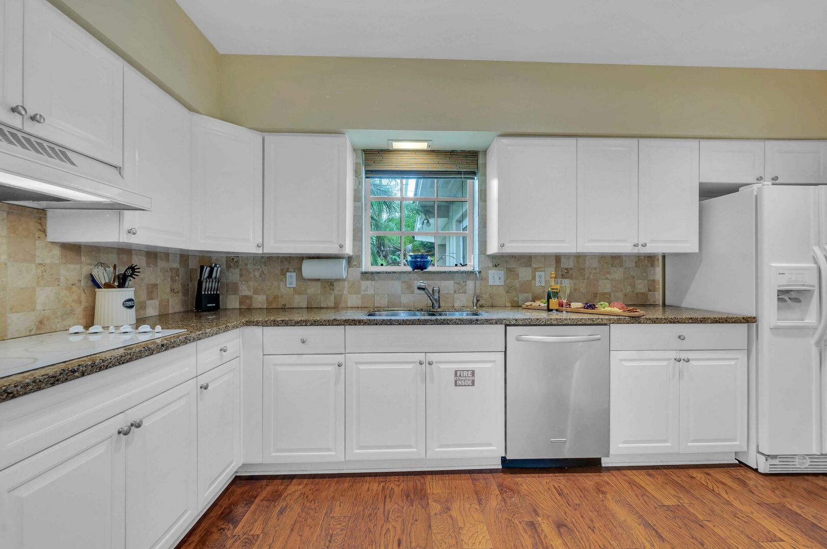 Spacious kitchen with access to breakfast eating area and laundry room.
