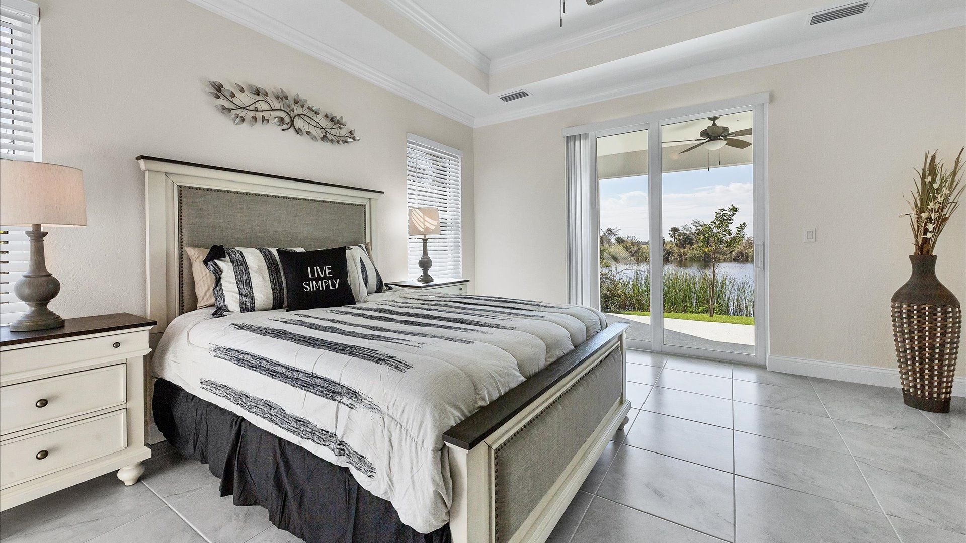 Queen master bedroom with ensuite bathroom and lanai access