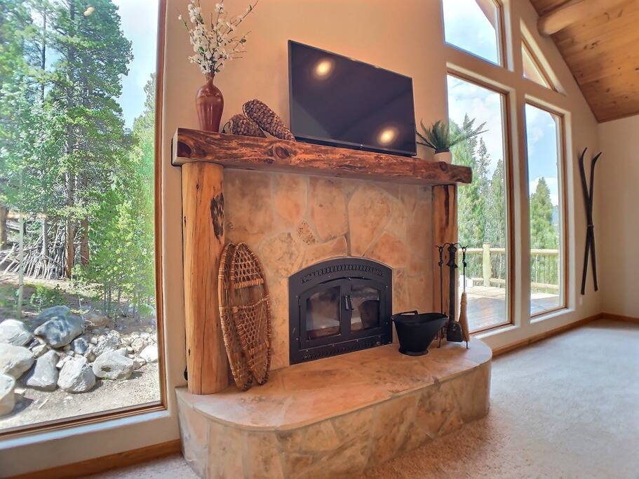Cozy up by the fire, and take in the views.  Our fireplace uses Duralogs for safety.