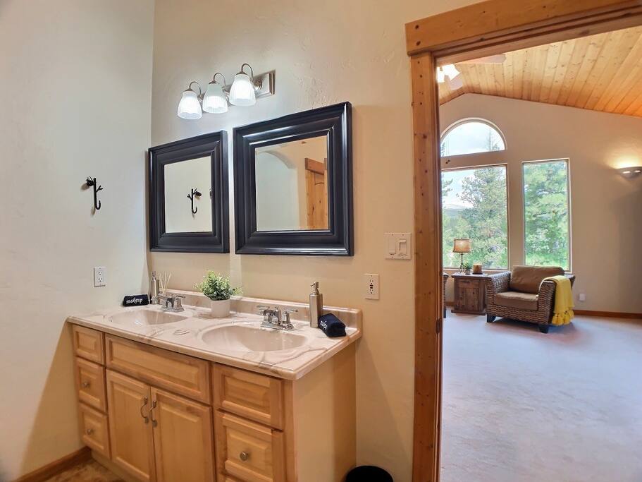 Spacious and well appointed master bath.  This room features a large walk in closet, and huge walk in shower.