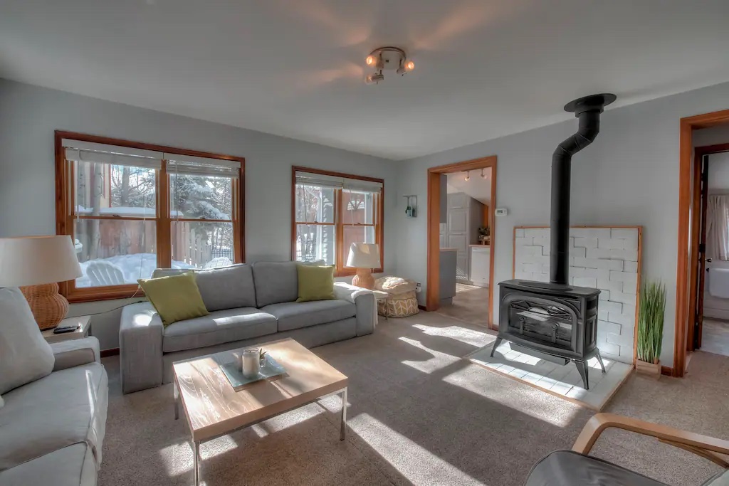 Spacious living area with a radiant gas fireplace for warmth and ambiance.
