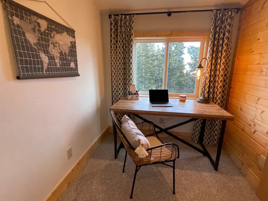 Take care of a few quick work tasks in the private office, located in the upper master suite.