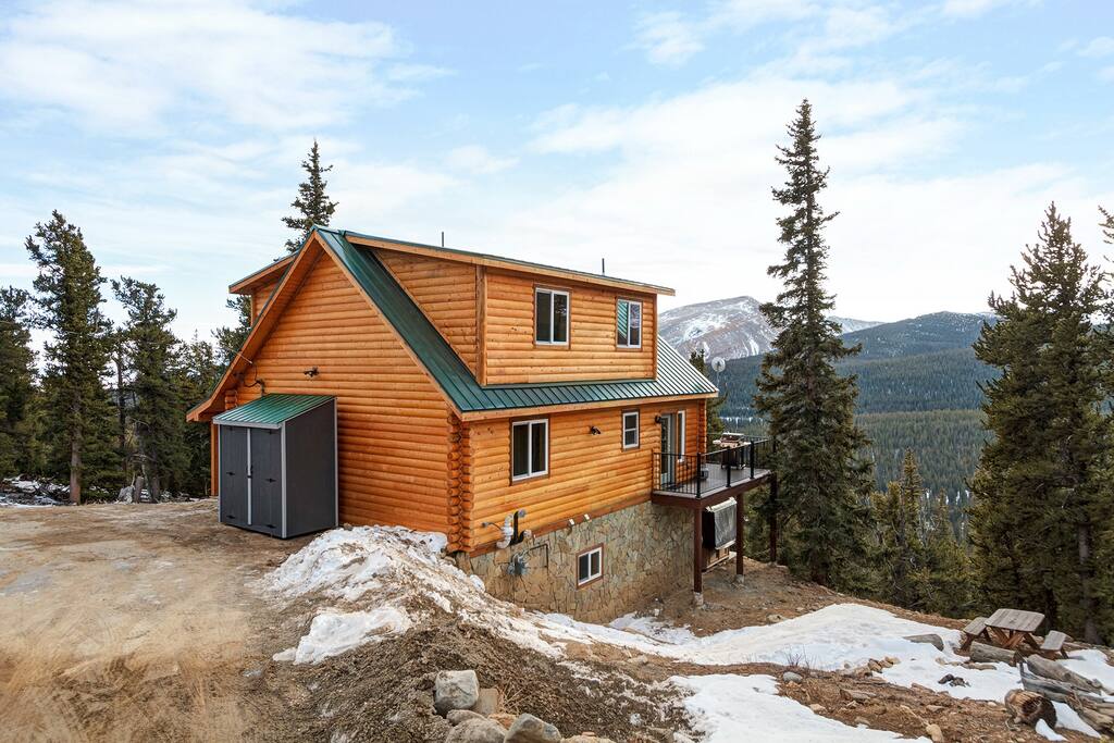 This 3 story cabin is surrounded by trees and mountain peaks. It has been fully renovated and is brand new to the market as of December 2020.  Filled with special touches, ultimate comfort and design, with views that don't stop