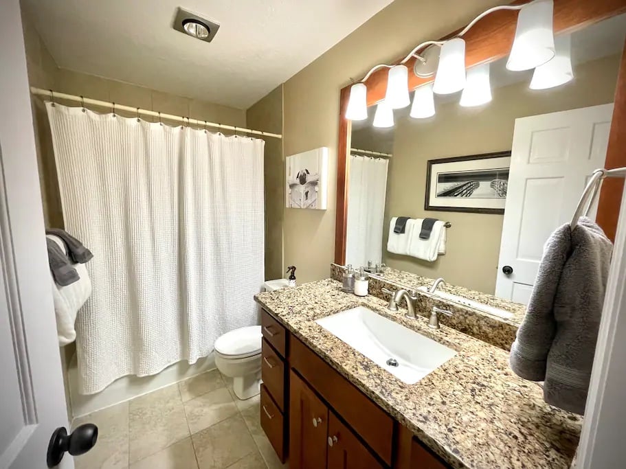 One of three full bathrooms in the home.  One on each level of the home allows for ultimate guest comfort.