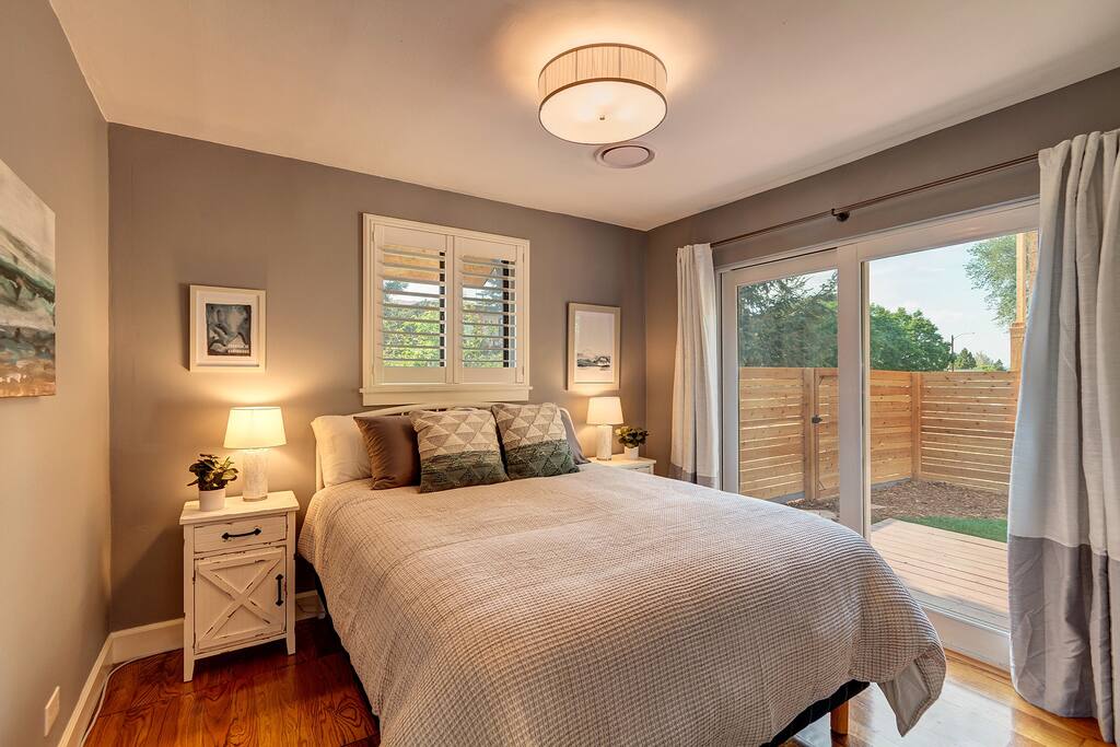 We love this room! So bright, crisp and cozy. Brand new pillow top queen, with luxury linens and a full walkout slider to the back yard. Black out shades and white noise ensure a great nights sleep.