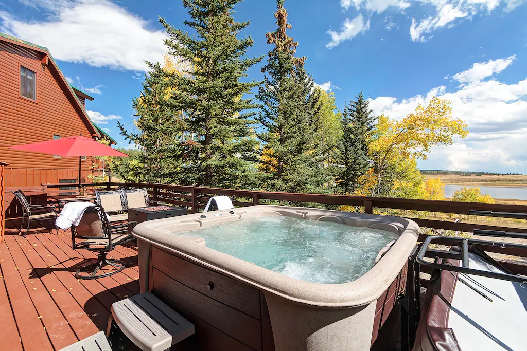 Brand New Hot Tub, with views of the lake and gas fire pit on the deck!