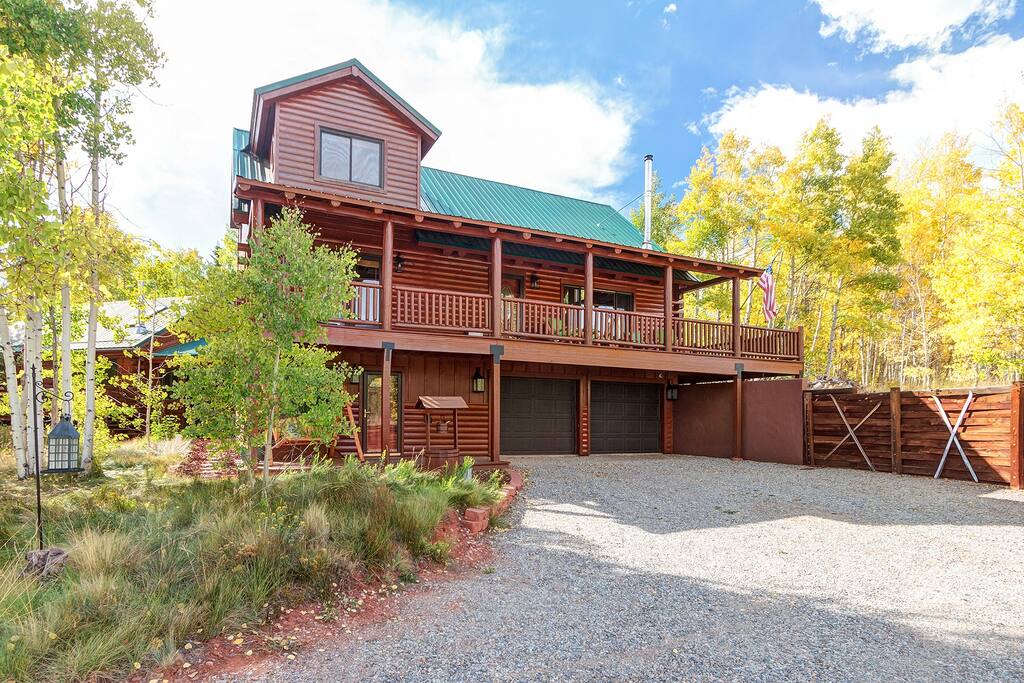 Wrap around decks on both sides of the cabin allow you to enjoy the Aspen and Lake Views from multiple seating areas.  Garage included with Tesla Charger.