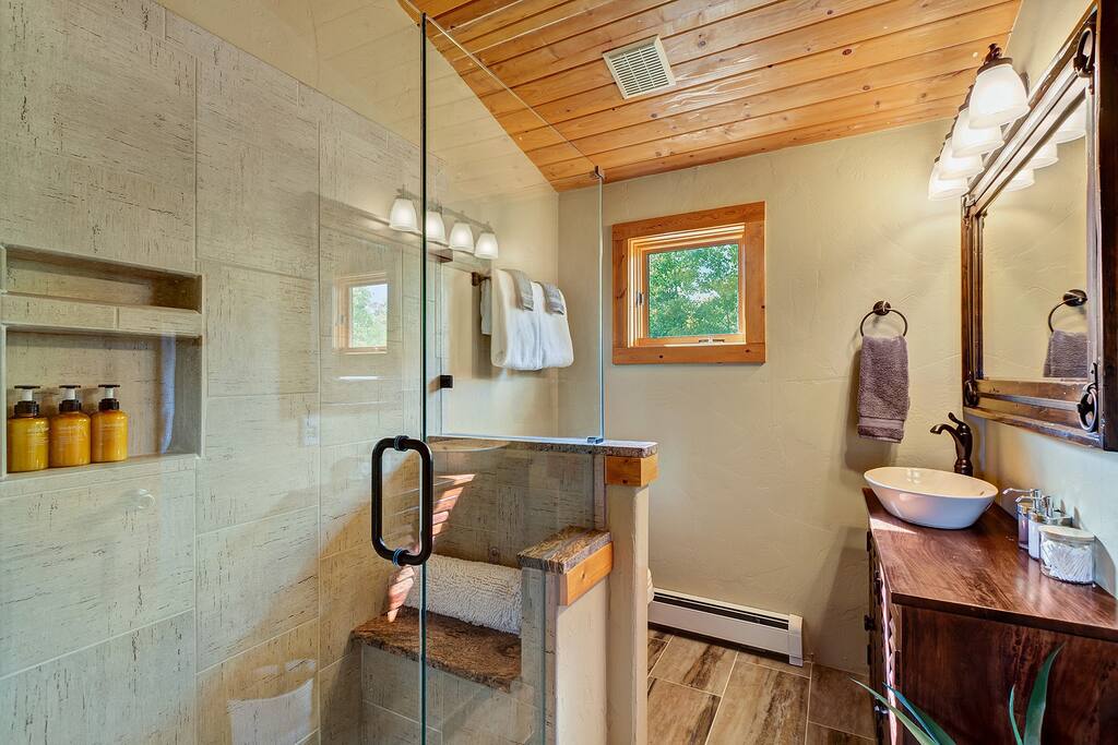 Full shower bathroom with shampoo, conditioner, body wash, 3 ply tp and plush towels provided in every bathroom!