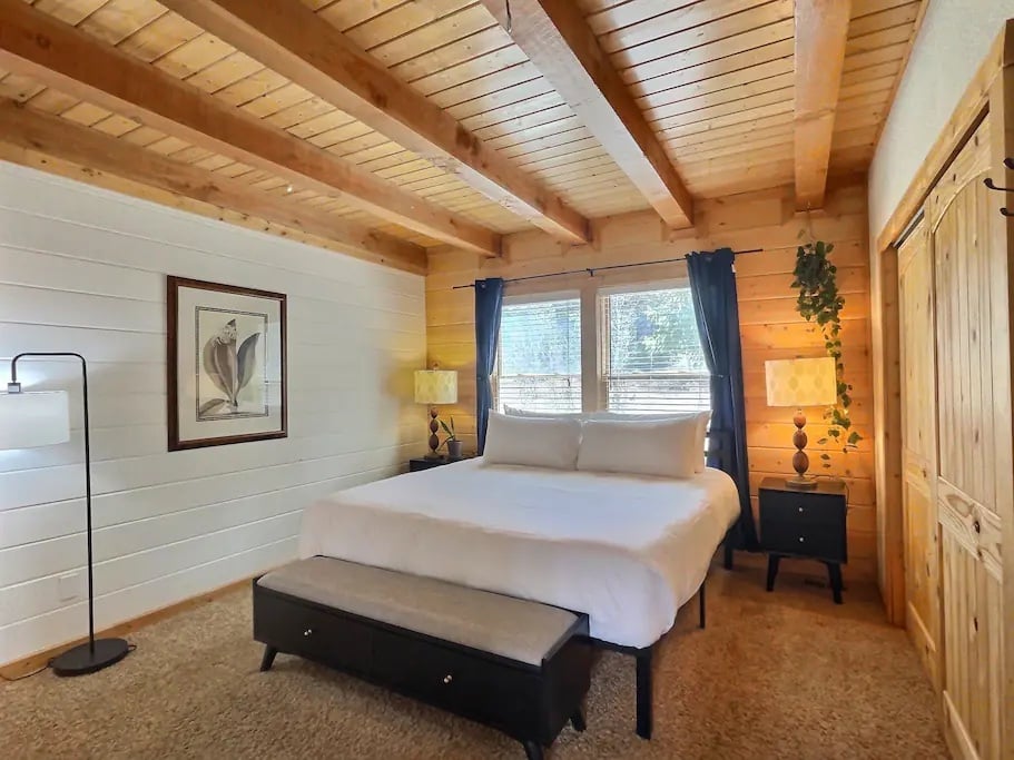 Master on main floor w/ plush bedding on the king bed and full ensuite bathroom