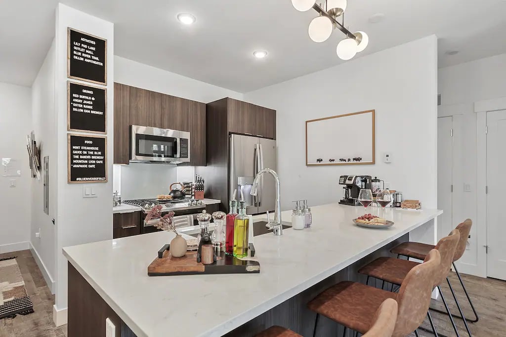 FULLY stocked kitchen helps you feel right at home when staying in this condo.