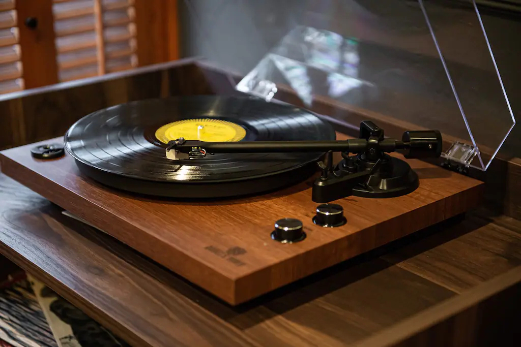 Listen to one of our vinyl records or bring your own.  The blue tooth enabled speakers will connect to your phone for even more listening choices.
