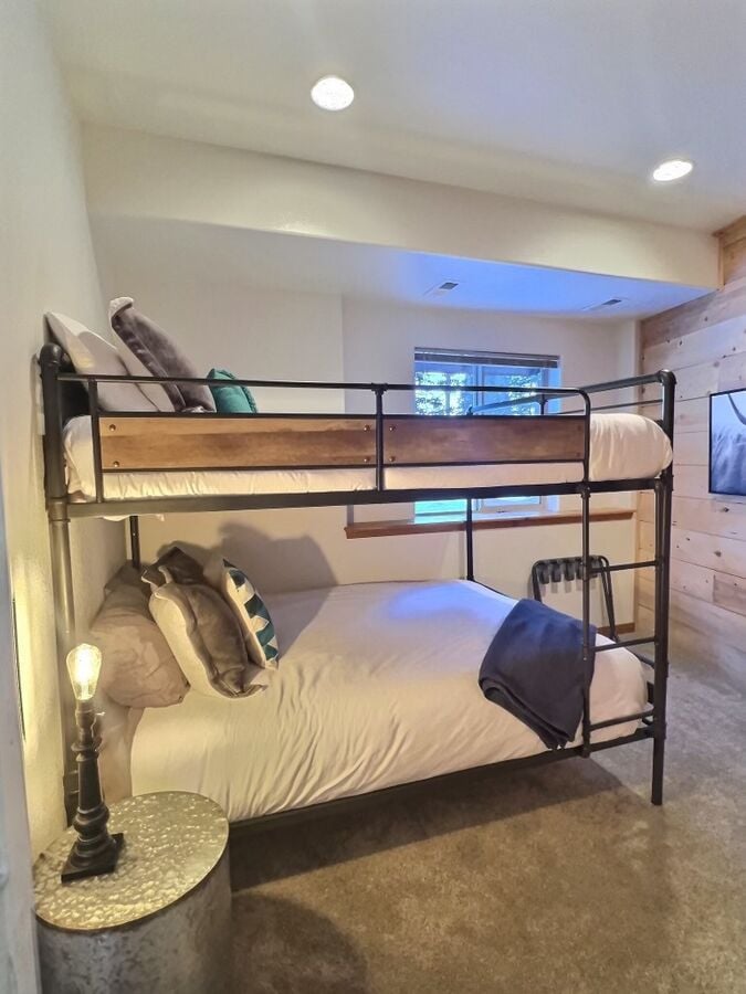 Bonus Bedroom with Queen over Queen bunks for extra sleeping arrangements in the downstairs off of the rec room.
