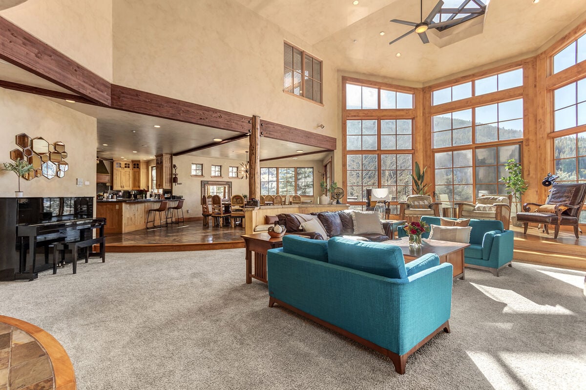Floor to ceiling windows allow for a lot of bright Colorado sunshine to enter the home
