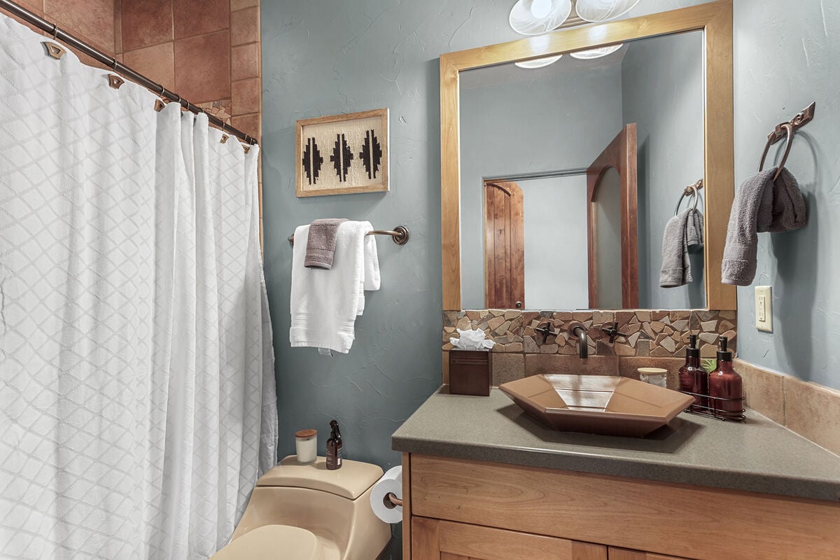 Each ensuite bathroom is fully stocked with push bath towels, hand towels, wash cloths, 3 ply TP, hair dryer, qtips, cotton balls, kleenex, premium body wash, shampoo & conditioner.