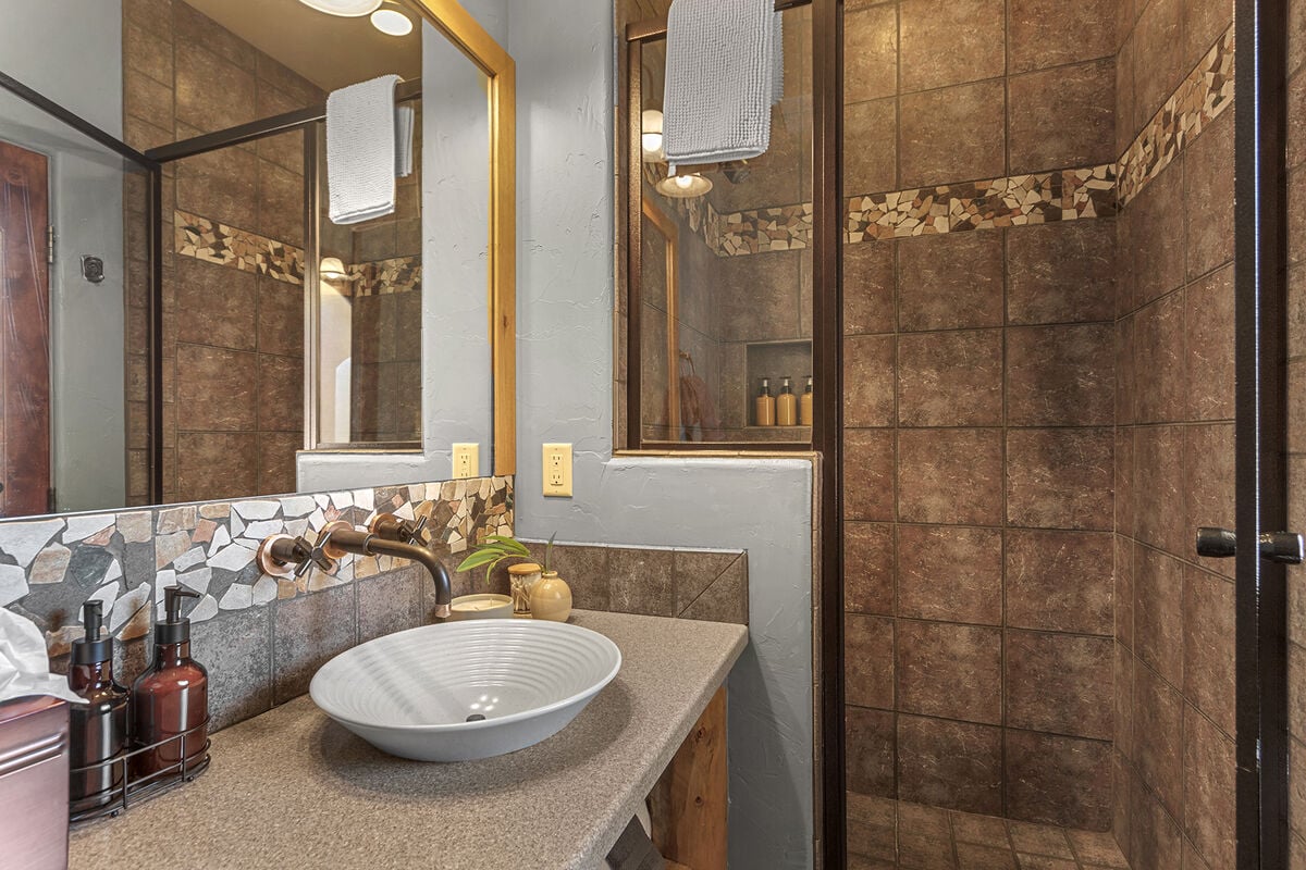 Each ensuite bathroom is fully stocked with push bath towels, hand towels, wash cloths, 3 ply TP, hair dryer, qtips, cotton balls, kleenex, premium body wash, shampoo & conditioner.