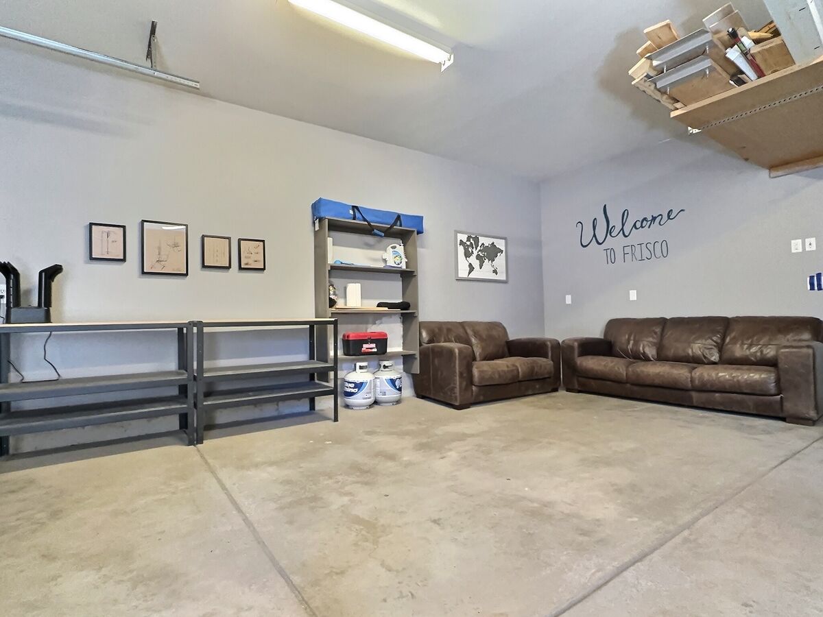 Seating area, tool bench, boot warmer set up on garage. A great place to store your gear.