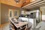 This open kitchen/dinning area creates a great opportunity to cook, eat and entertain together with loved ones