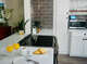 Open passthrough to the kitchen parlor area, chat with friends while you host and make meals for your loved ones