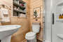 Upstair guest bathroom with shower. Each bathroom has shampoo, conditioner, body wash, plush towels, 3 ply tp and more!