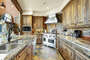 Gourmet Kitchen with high end appliances and finishings, comes fully stocked for guests