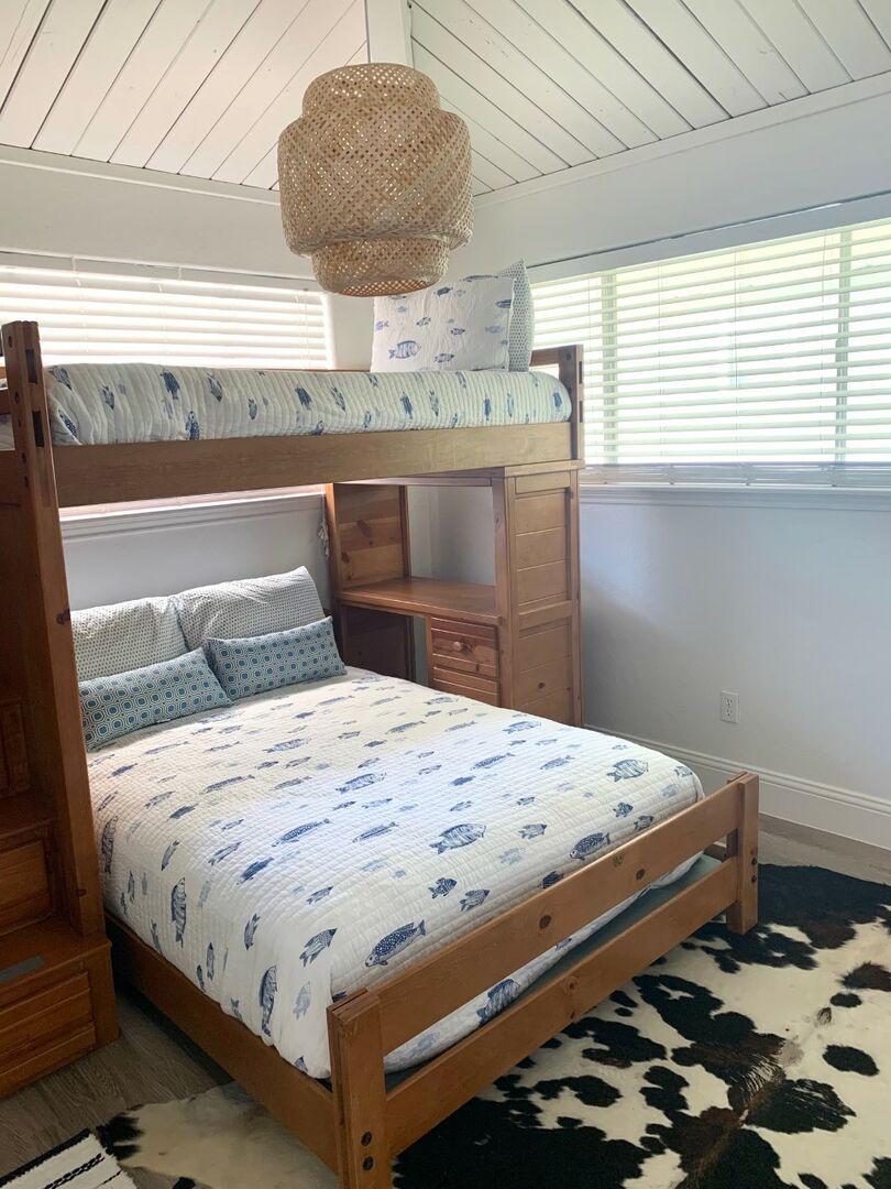 Kids will love this set up with a full and twin bunk bed.