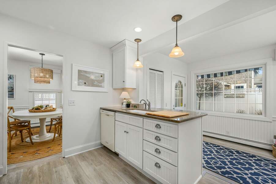 The kitchen has plenty of preparation space and connection to both dining and outdoor areas - 5 Zylpha Road Harwich Port Cape Cod - The Sandbox - NEVR
