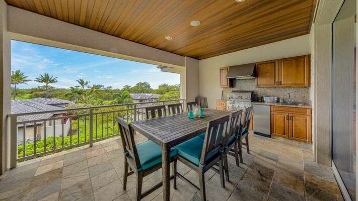 The large outdoor lanai provides a complete outdoor kitchen featuring a built-in BBQ