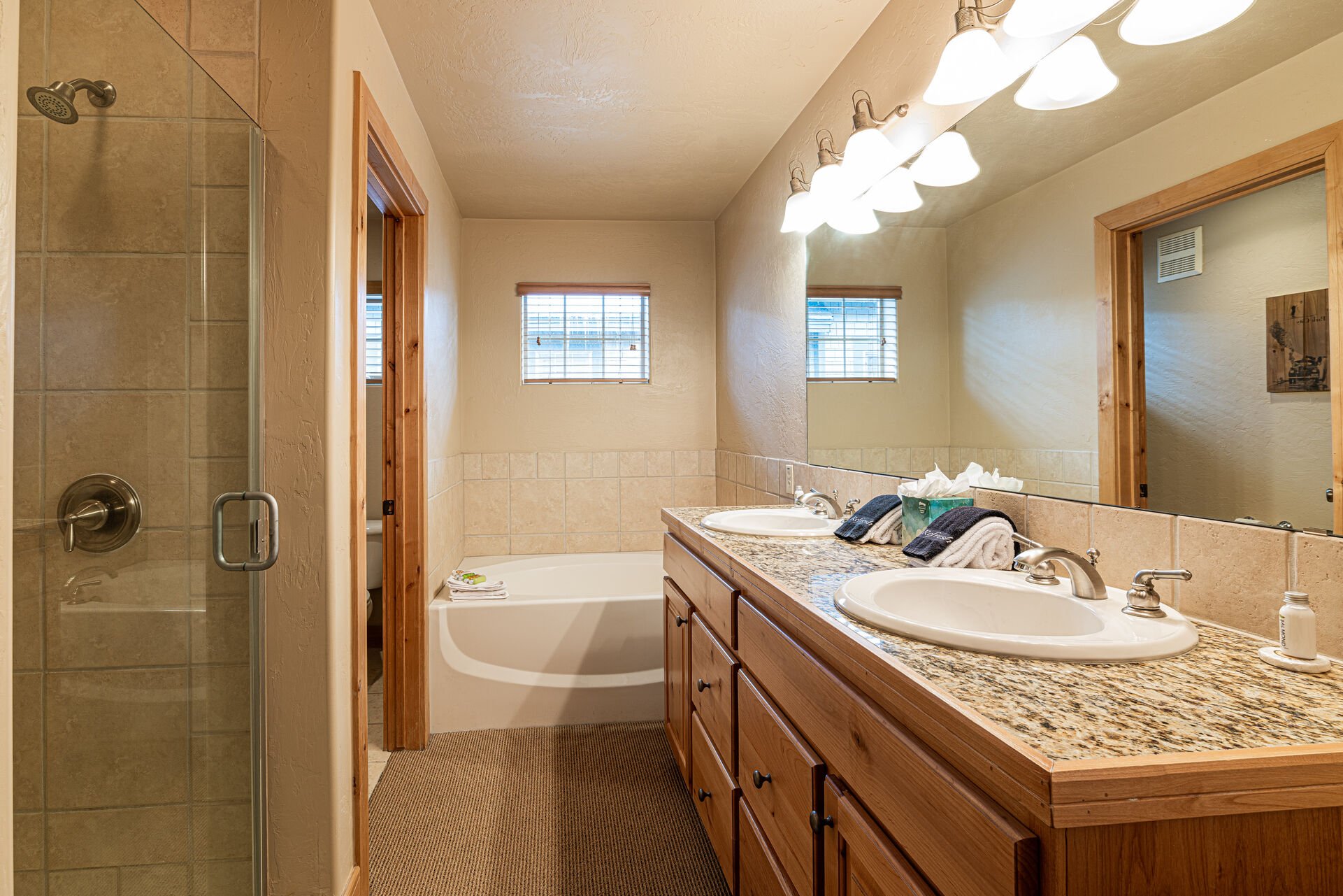 Master Bath with Two Sinks and a Shower