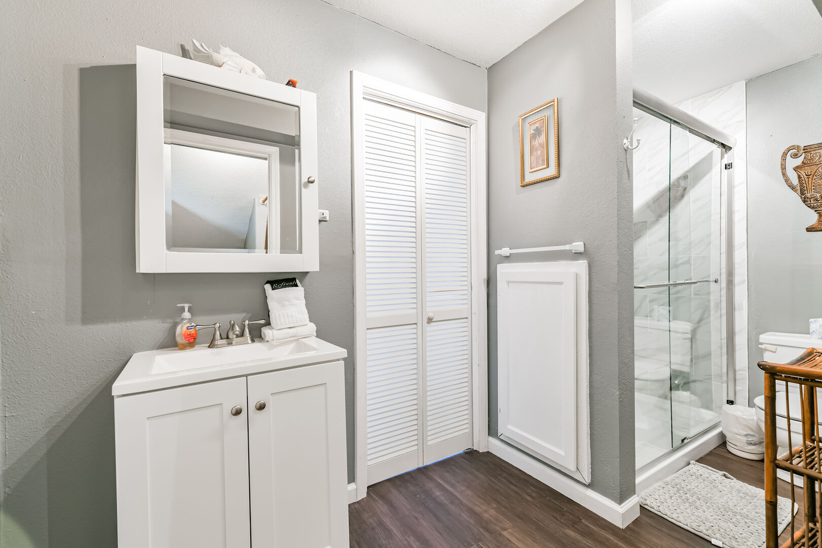 Nicely remodeled downstairs bath with walk-in shower.