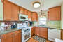 Kitchen with full size appliances and granite counters