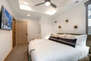 Master Bedroom 2 with king bed, smart tv, and en suite bathroom